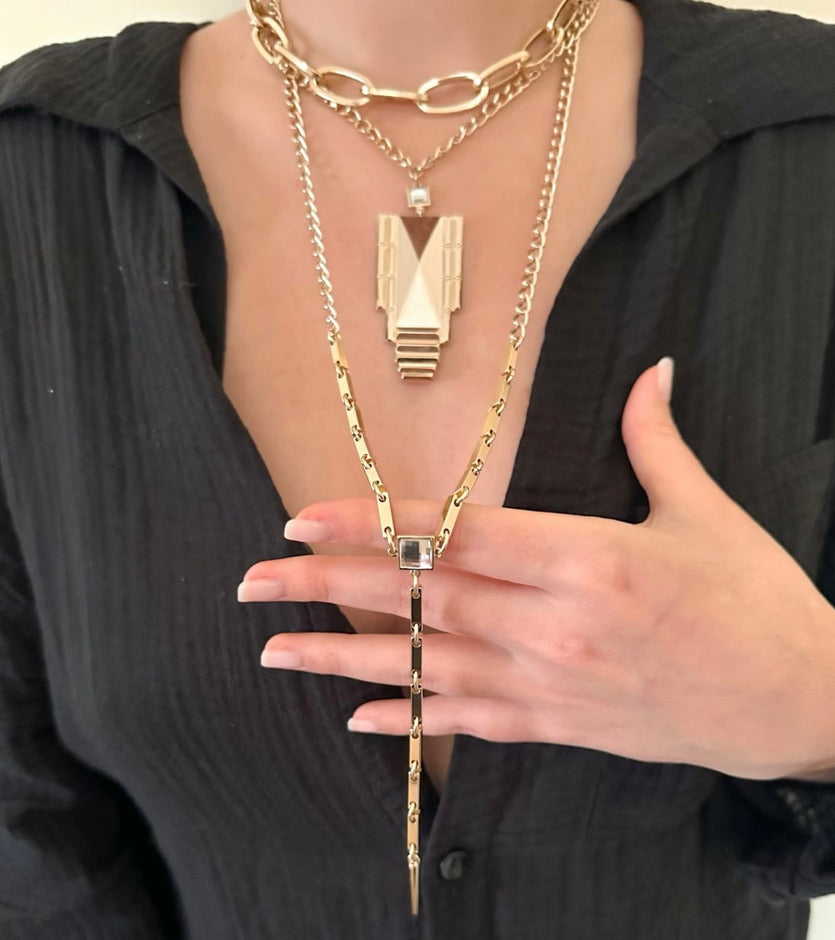 
            
                Load image into Gallery viewer, Gold Art Deco Long Pendant Necklace
            
        